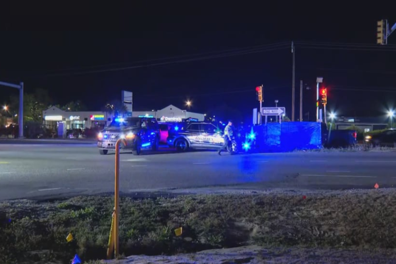 Video from WECT crews at the scene shows a blue tarp set up in the middle of the road.