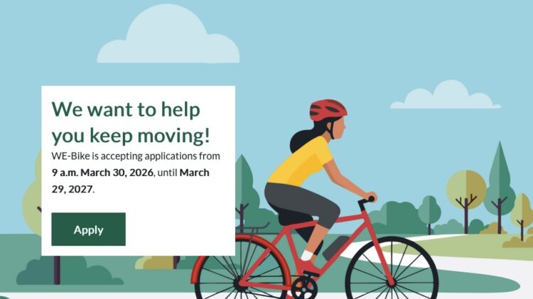 Illustration of a person riding an e-bike on a tree-lined path. Text: We want to help you keep moving! WE-Bike is accepting applications from 9 am March 30, 2026 until March 29, 2027.