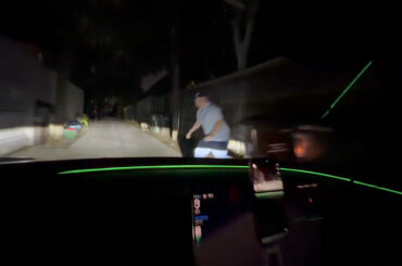 Tesla owner and his friend test the improved reaction time of FSD v14.3 by jumping in front of the vehicle from a dark spot on the side of the road.