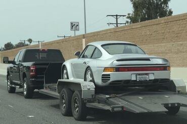 I spotted this [Porsche 959] with dealer plates leaving Newport Beach area headed north toward Los Angeles on an open trailer