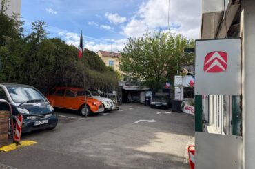 A couple of [Citroën 2 CV’s] and a [Citroën XM] in Gentilly, France.