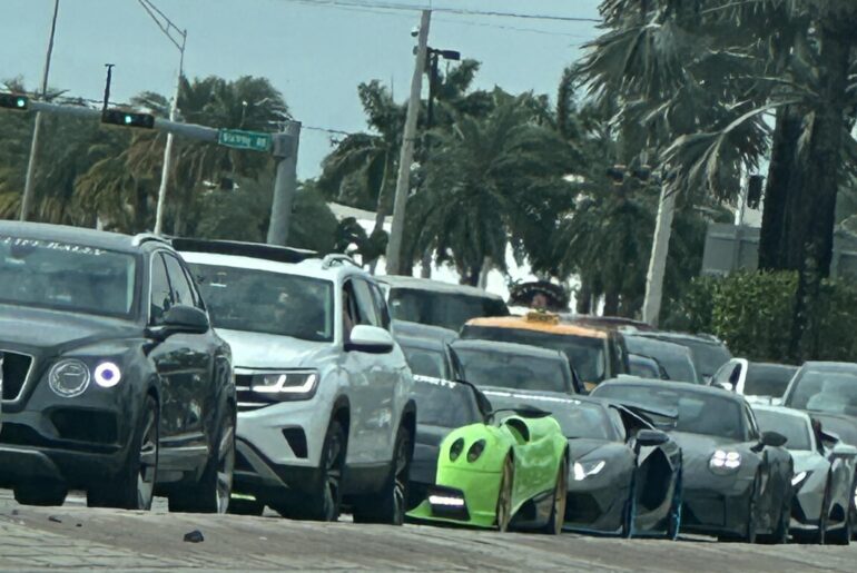 Saw a [Pagani Huayra] at the stop light a couple cars behind
