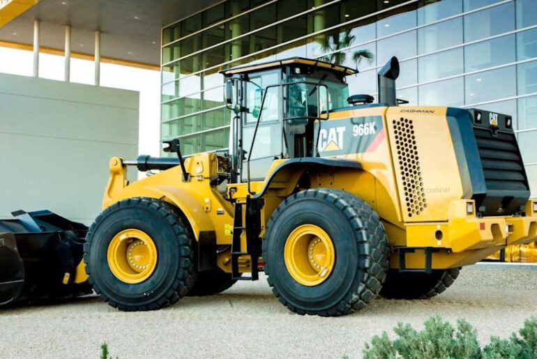 Caterpillar acquires self-driving 'Tesla of agriculture,' stock up 30% this year