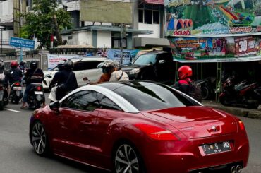 A clean [Peugeot RCZ] in a suburb of Jakarta, Indonesia. First time I’ve seen this car in this part of Asia.