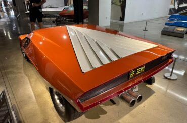 [Lancia Stratos HF Zero] with an exterior rear view mirror.