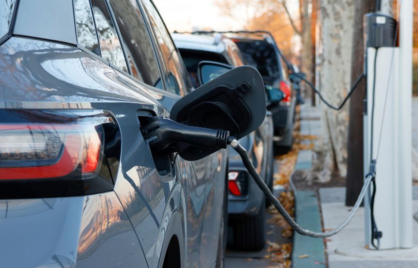 Electric cars recharge their batteries at a curbside electric vehicle charging station on December 1, 2024, in Jersey City, New Jersey.
