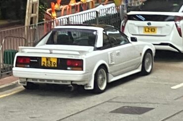 Bad pics but nice duo[Toyota MR2 and BMW 1M]