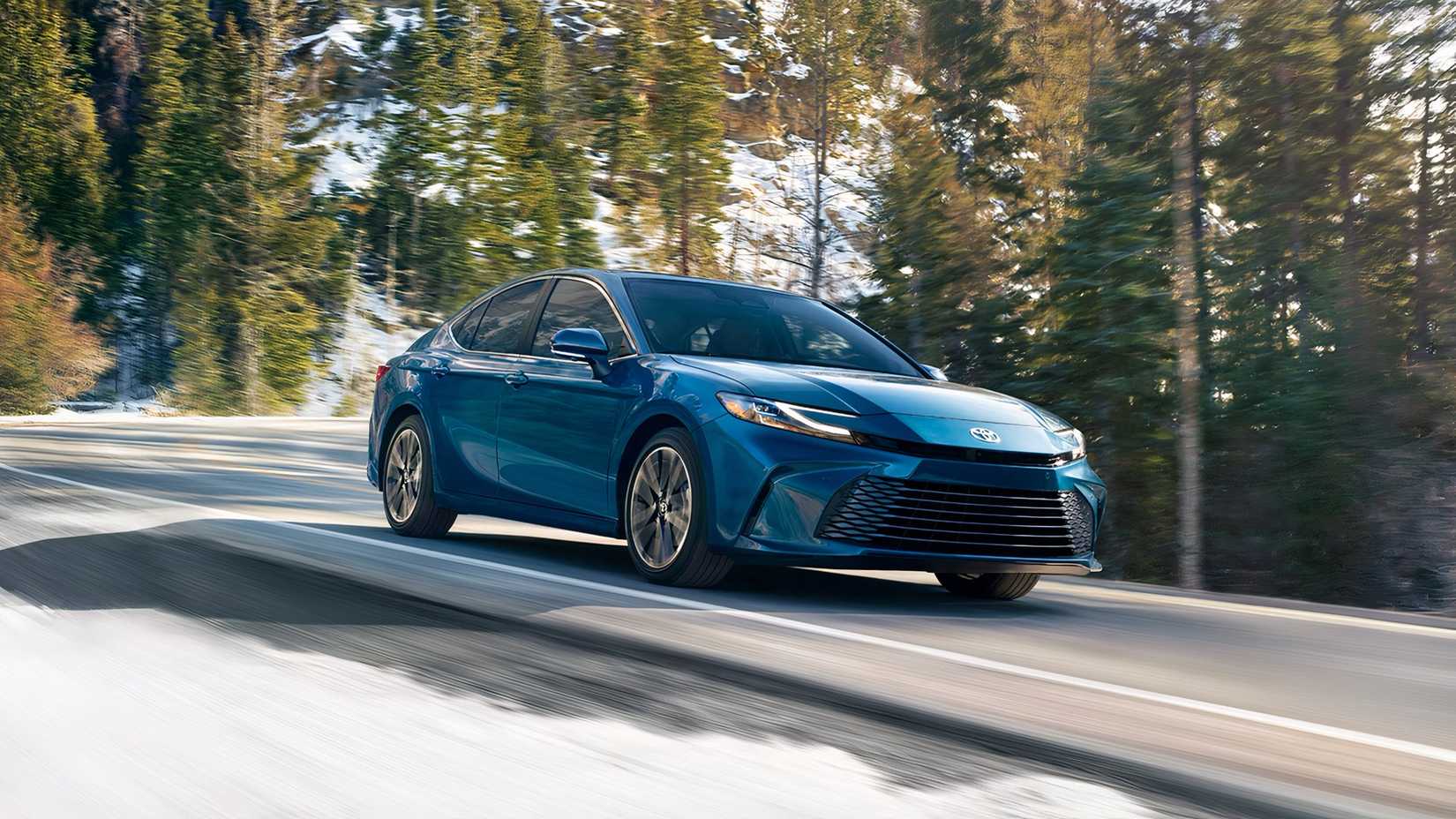 2026 Toyota Camry in blue being driven