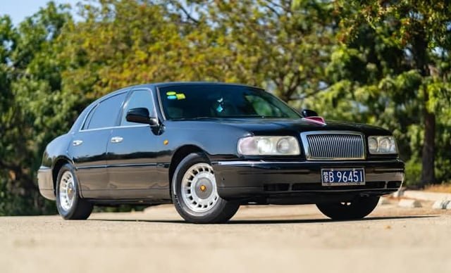 Hongqi Qijian CA7460 is a luxury sedan produced by the Chinese automaker FAW Group under its Hongqi (Red Flag) brand between 1998 and 2005. It is most notable for being a licensed rebadged version of the third-generation Lincoln Town Car, built on Ford's famous Panther platform.