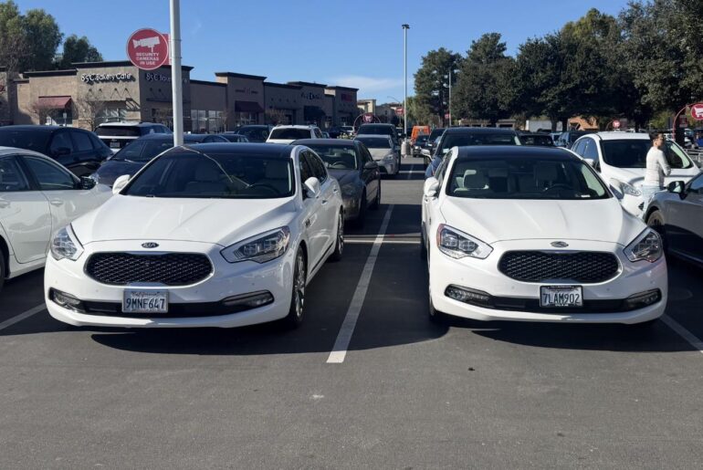 TWO [Kia K900 V8s] in the same parking lot