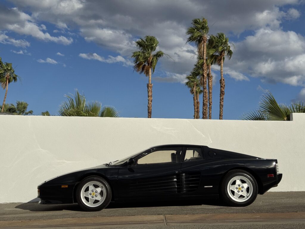 [Ferrari Testarossa] tucked into a back lot