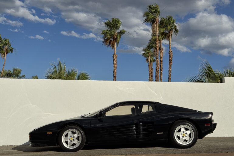 [Ferrari Testarossa] tucked into a back lot