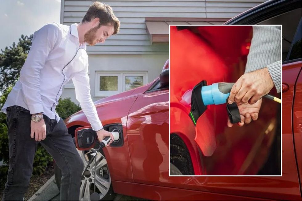 Man charging an electric car and an electric car being charged