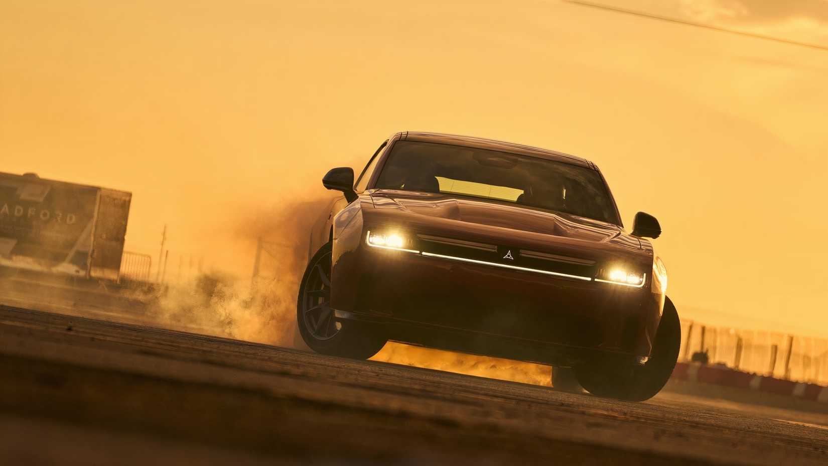 Front view of 2026 Dodge Charger Daytona doing a burnout
