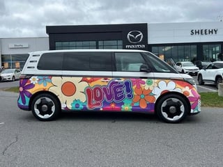 VW buzz with this paint the official car of ?