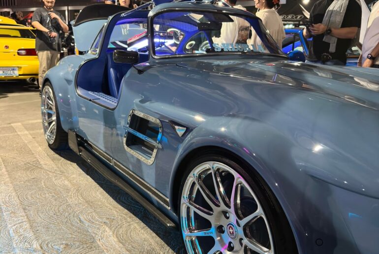 Mercedes 300 SL Gullwing Wide body with Tesla interior and possibly Tesla drivetrain. It has a crazy audio system