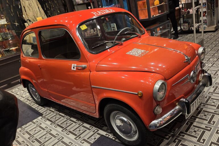 SEAT 600 - a licensed Spanish copy of the Fiat 600 that contributed to the "Spanish miracle". Here pictured in a Raima store in Barcelona