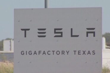 Travis County withholds grant funds for Tesla due to partial non-compliance in contract