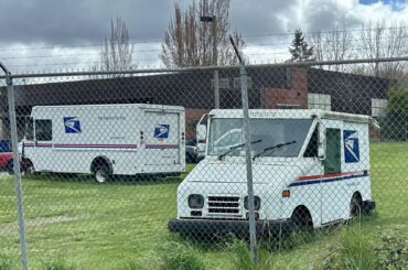 Grumman LLV in back lot of post office.