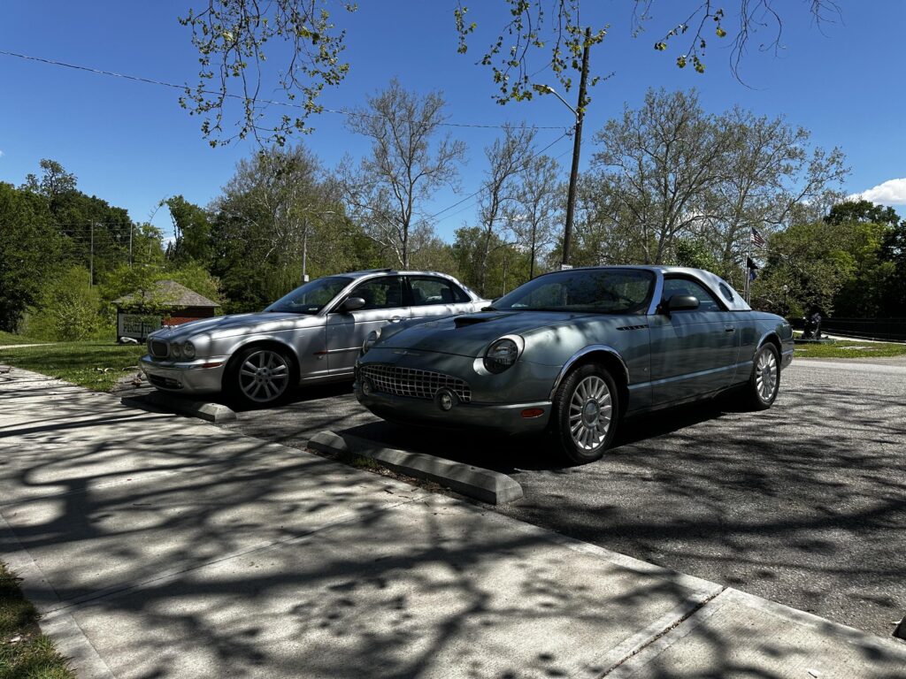 Two AJV8’s parked together, one loved by clarkson, and one despised by clarkson.