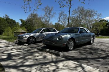 Two AJV8’s parked together, one loved by clarkson, and one despised by clarkson.