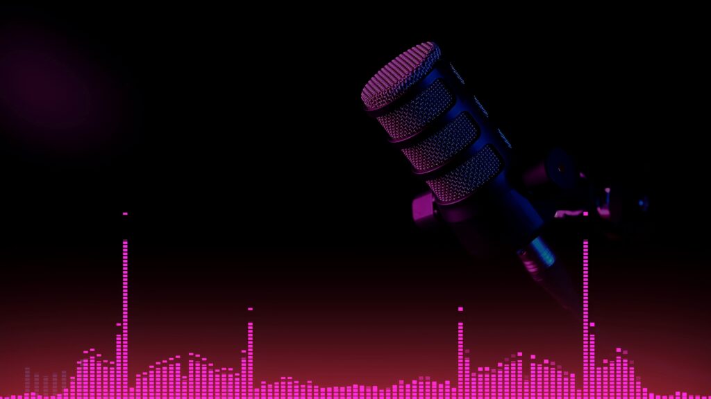 Studio microphone with neon sound wave on dark background