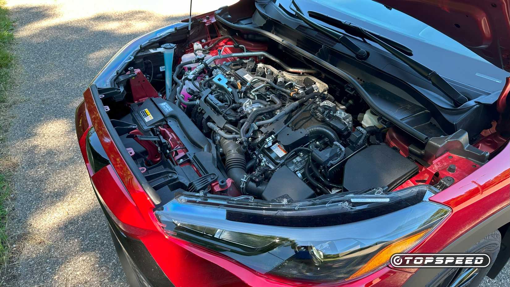 2025 Toyota Corolla Cross Hybrid Nightshade close-up shot of the engine
