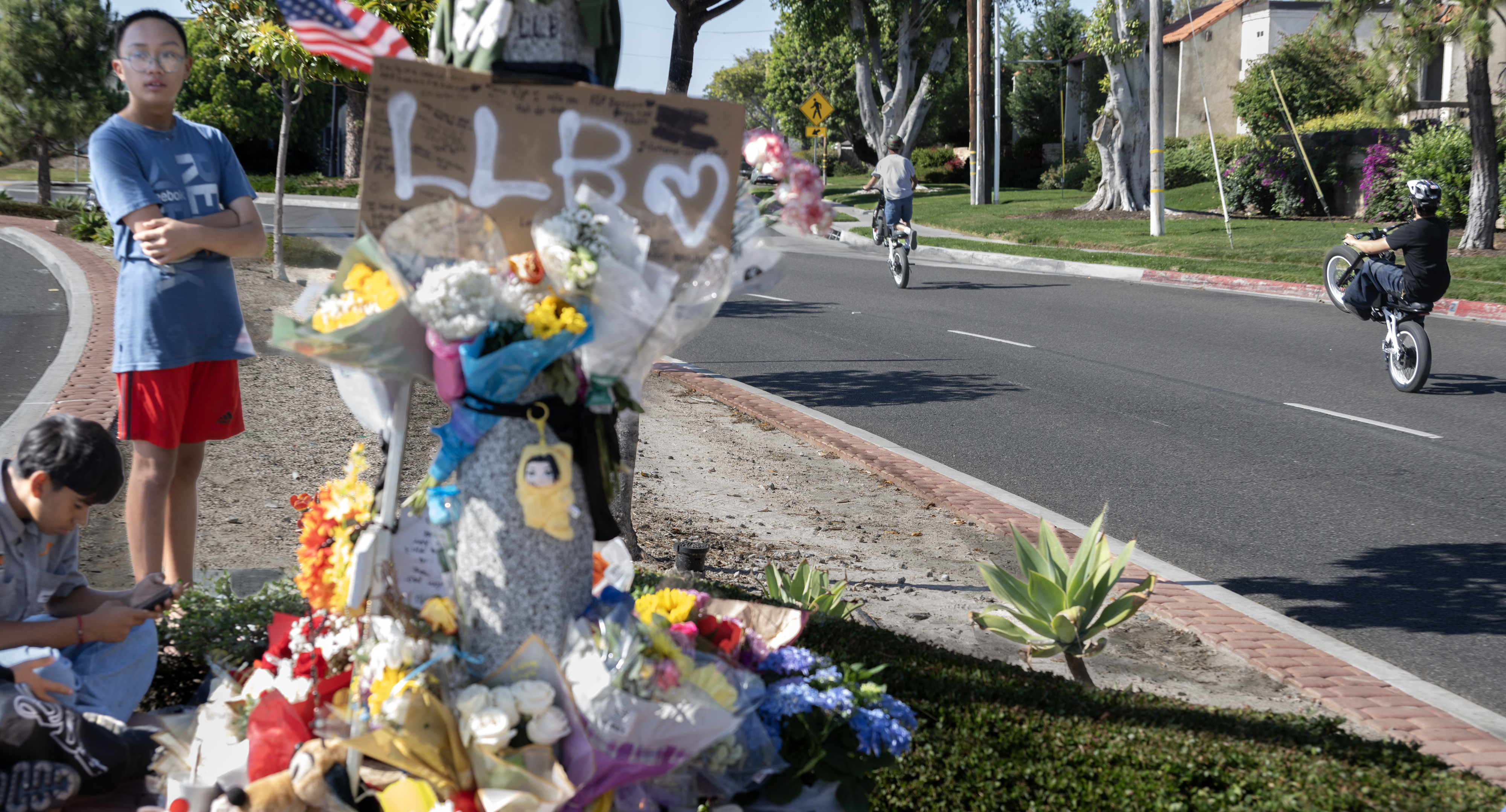 Friends pay tribute to a 13-year-old boy who died after...