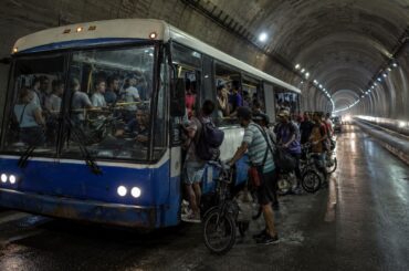 A bus that crosses an underwater tunnel in Havana Bay has become Cuba's most essential means of transport during the worst fuel crisis in decades; the Ciclobús carries 2,000 people a day with their bicycles and electric motorcycles because gasoline has been rationed to 20 liters per vehicle.