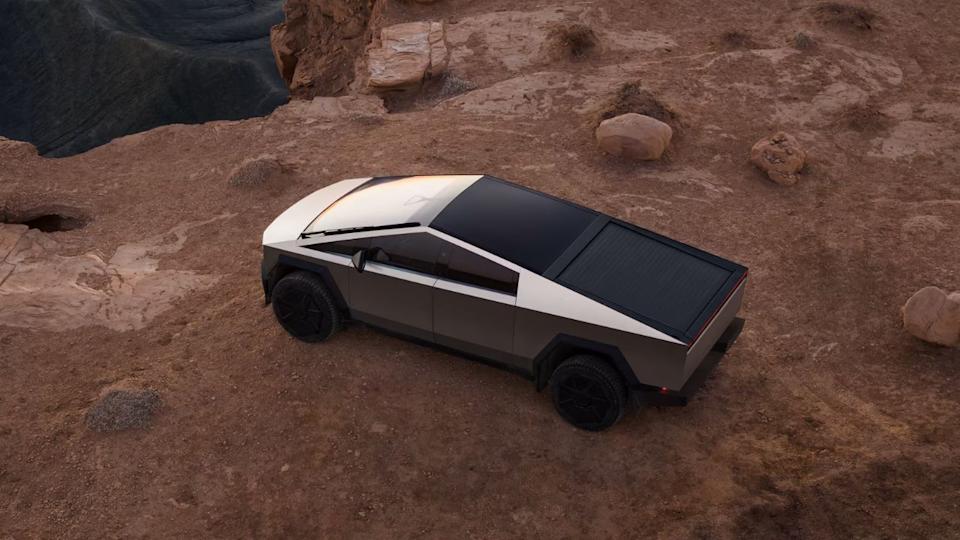 Tesla Cybertruck rear top angle view offroad