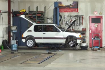 Saw this [ Peugeot 205 GTI ] getting some maintenance.