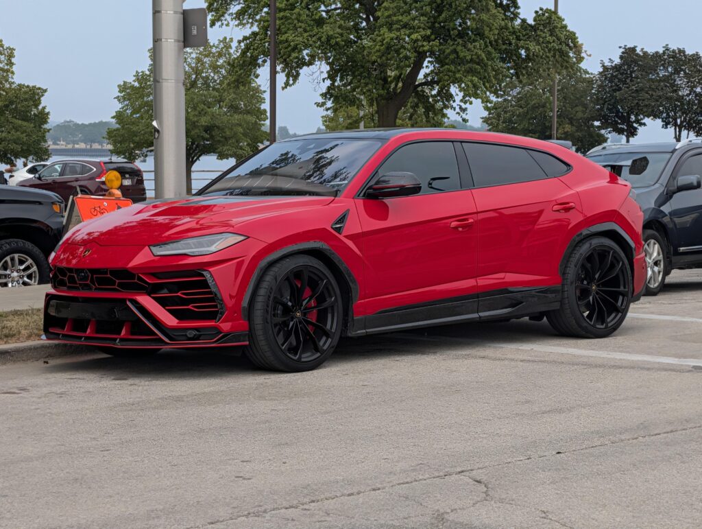 [Lamborghini Urus] parked on the street
