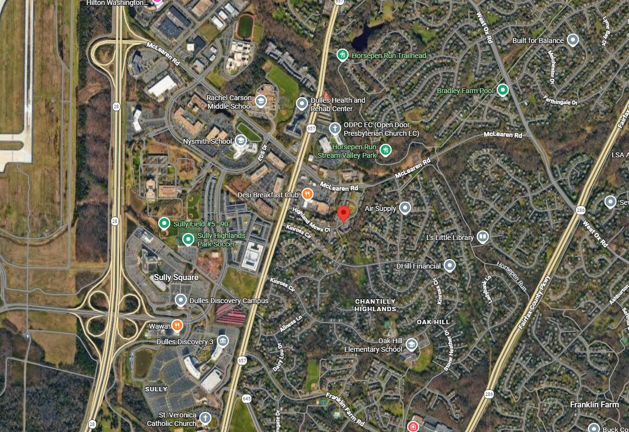 Satellite map of a suburban area around McLearn Rd and Route 28, showing schools, parks, and neighborhoods labeled nearby.