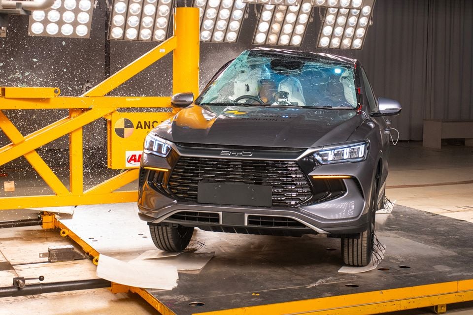A grey 2026 BYD Sealion 5 SUV with its windscreen shattered during an ANCAP crash test, seen from the front.