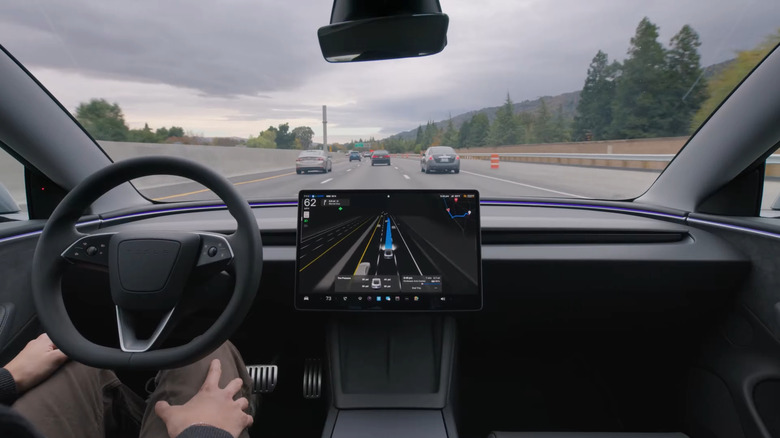 Tesla's Full-Self Driving (Supervised) navigating on a highway.