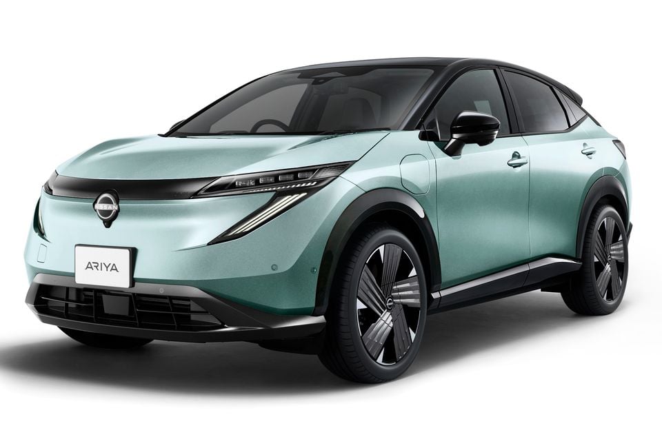 A light green 2025 Nissan Ariya electric SUV shown from the front quarter angle on a white background.